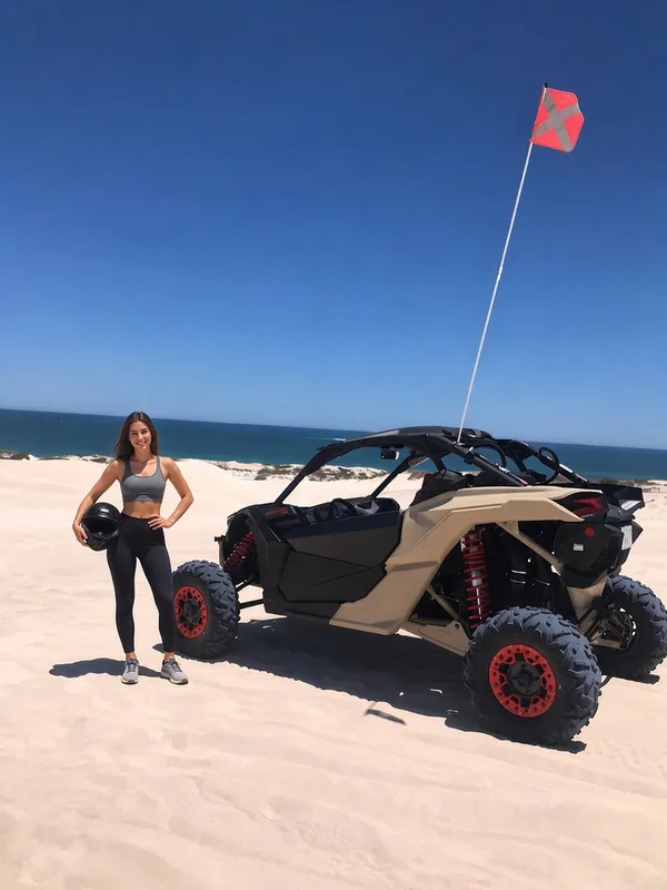 Guest with helmet after a dune ride