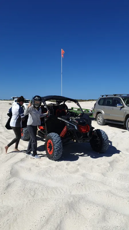 Thumbs up on the dunes after a ride