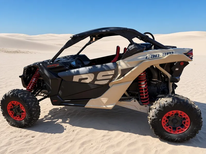 Can-Am Maverick parked on sand dunes